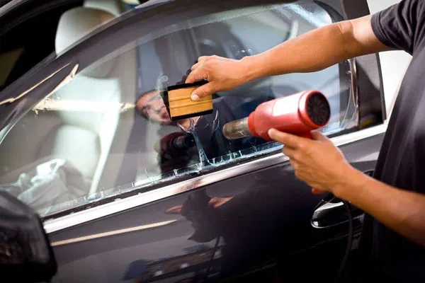 Car sun control film installation for heat and UV protection in Chennai